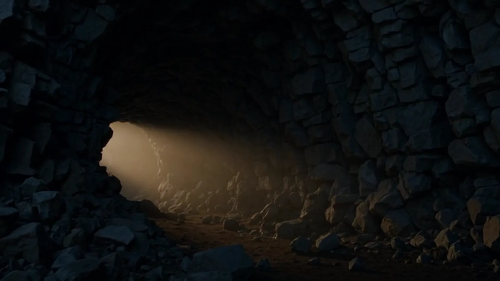 Entrada de uma caverna escura com um feixe de luz suave entrando